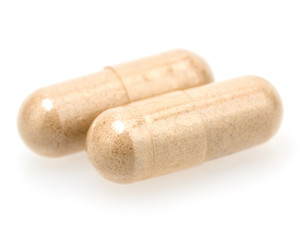 closeup of pills isolated on white background