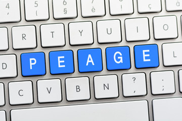 PEAGE writing on white keyboard