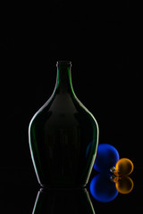 Silhouette of elegant and very old wine bottlesand Christmas dec