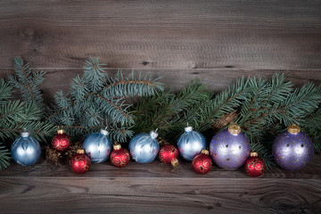 Christmas background with decorations on wooden board