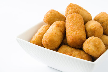 Traditional fried Spanish croquettes isolated on white background

