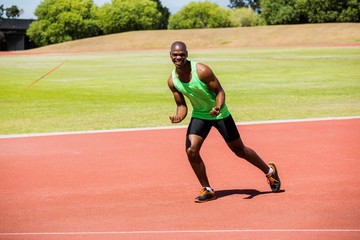 Obraz premium Portrait of a happy athlete posing