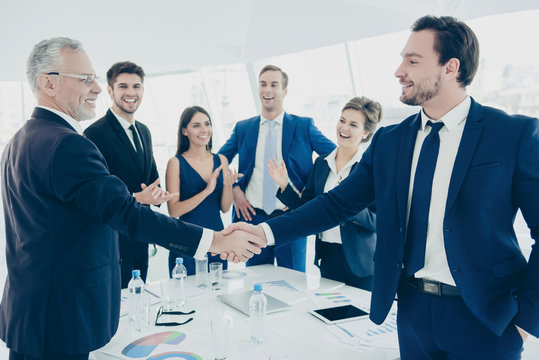 Happy Businessmen Shaking Hands For Successful Resolving Dispute