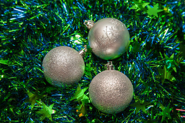 New Year's decorations on the texture tinsel