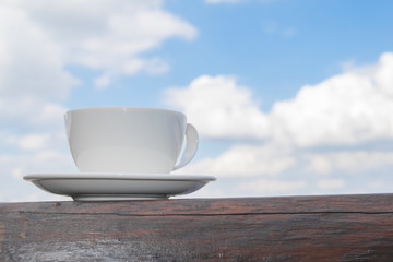 Close up white cup of Coffee, latte on the wooden table