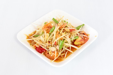Thai food papaya salad on white dish
