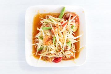 Thai food papaya salad on white dish