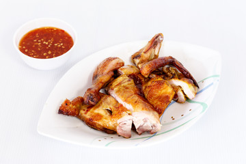 Grilled chicken on dish