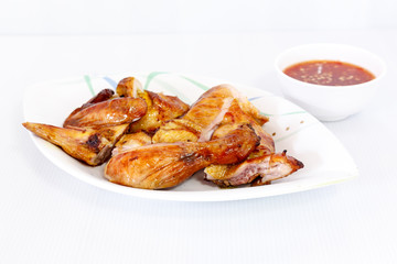 Grilled chicken on dish