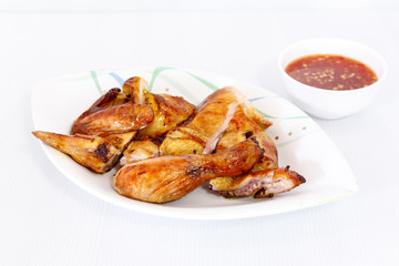 Grilled chicken on dish