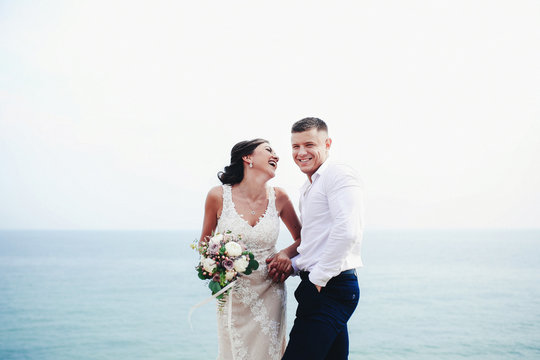 Newlyweds and sea