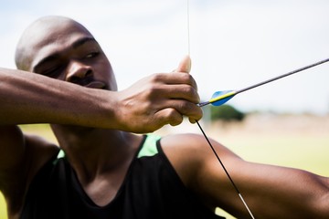 Athlete practicing archery