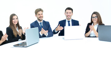 Business team, sitting at athe round table on white background.