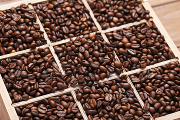 Roasted coffee beans in wooden basket