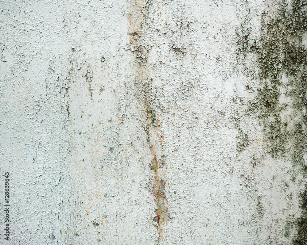 Wall mural Grungy weathered peeling paint background. Rusty metal texture.