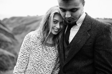 Amazing newlyweds near the hills