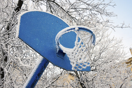  Snow covered basketball hoop