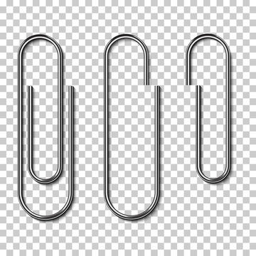Metal paperclips isolated and attached to paper