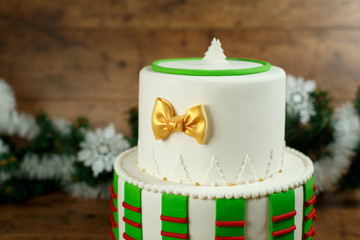 beautiful Christmas green cake on a wooden background
