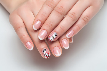 New Year's  French white manicure with painted snowman on oval nails