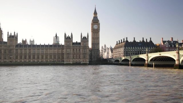 Big Ben Tower and Westminster Bridge at Thames River in London