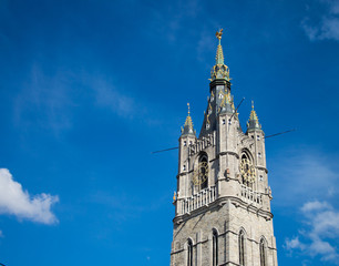 Fototapeta na wymiar Grand Belfry with clock in Ghent, Belgium