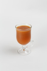 winter drink sea-buckthorn on a white background
