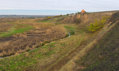 Autumnal landscape with small river Sura in Dnepropetrovsk oblast, Ukraine