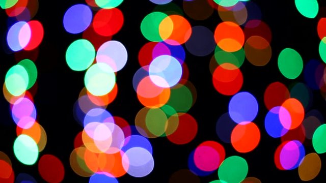 colored lights on a black background