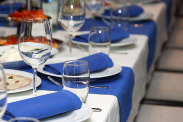 serving banquet table in a restaurant in blue and white style