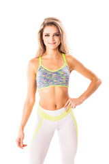 Obraz premium Beautiful sportive female posing on white background