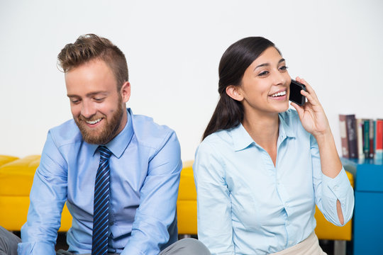 Happy busy managers working together