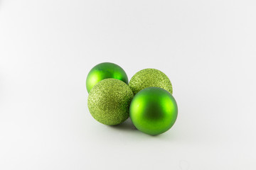 Green christmas balls isolated