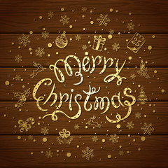 Fototapeta na wymiar Merry Christmas with decorations on brown wooden background