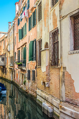 Obraz na płótnie Canvas Canal with beautiful medieval facades. Venice, Italy.
