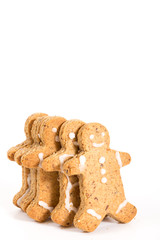 Gingerbread men cookies, on white background with copy-space.