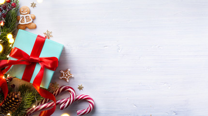 Christmas holidays composition on white wooden background with C