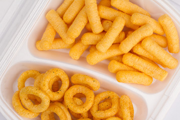 unhealthy eating concept on yellow