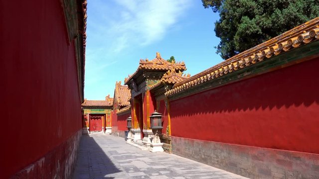Oriental red gate inside Beijing Forbidden City, China