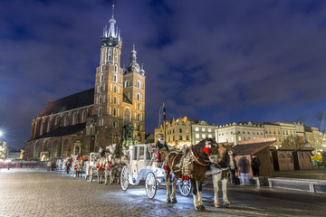 Naklejka na ściany i meble Mary's Church and white carriage, Krakow, Poland