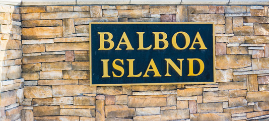 Balboa Island sign on a stone wall