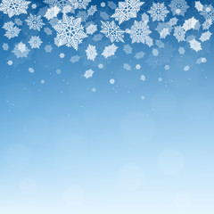 Christmas  winter  blue background with falling snowflakes.