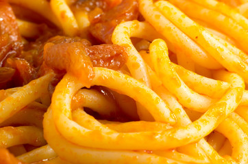 Close-up view of the cooked spaghetti with onion sauce