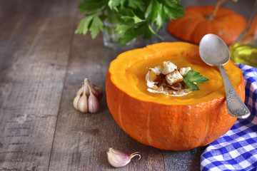 Pumpkin soup with croutons,cheese and caramelized onion.