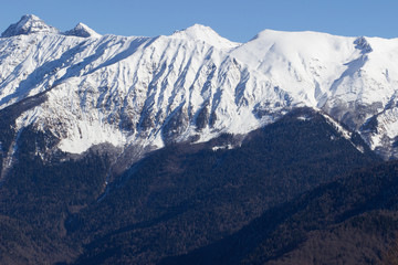Mountains with snow-capped peaks in late autumn