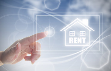 Hand clicking on rental house