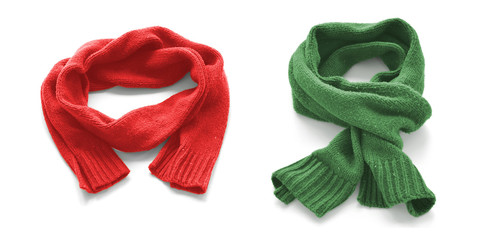 Red and green warm scarves on a white background.