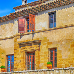 rural sandstone house with shutter windows in  Provence, France