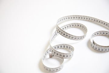 Measure tape and white background