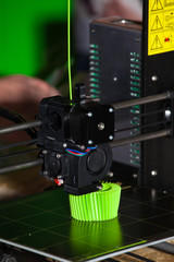 Fototapeta na wymiar 3d printer printing. Close up process of new printing technology